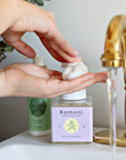 Hands dispense a foam of the Lavender Everything soap for your kitchen or bathroom sink.