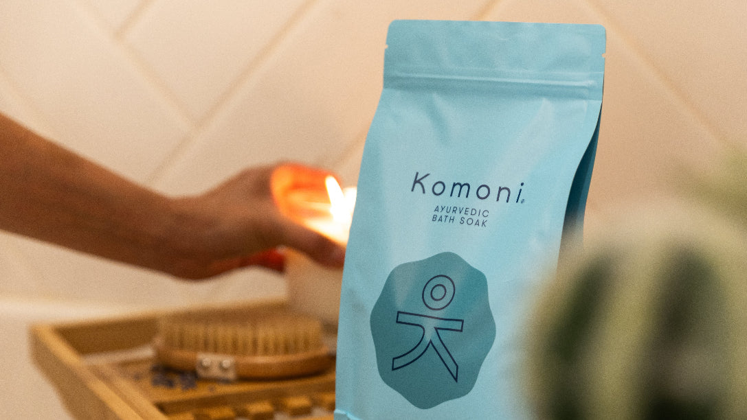 RECOVERY bath soak 2 pound package with a blurred background of a bathroom setting.