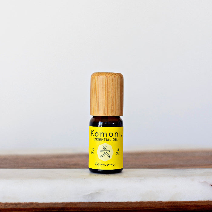 A 10ml vial of Lemon pure essential oil with attractive bamboo wood top.